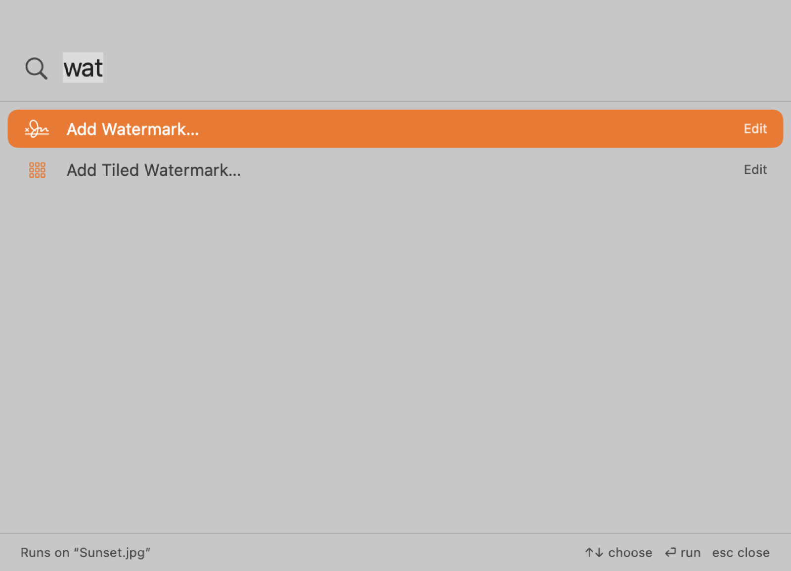 The Find a Tool palette listing watermark tools for a photo